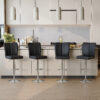 Modern Black PU Bar Stool Set - 2-Piece, featuring vertical and smooth-lined backrests with trumpet-shaped silver metal legs. Ideal for placement in bars, living rooms, lounges, and similar settings - Image 4