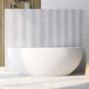 67 in. x 31 in. Oval Freestanding Solid Surface Soaking Bathtub with Center Drain in Matte White